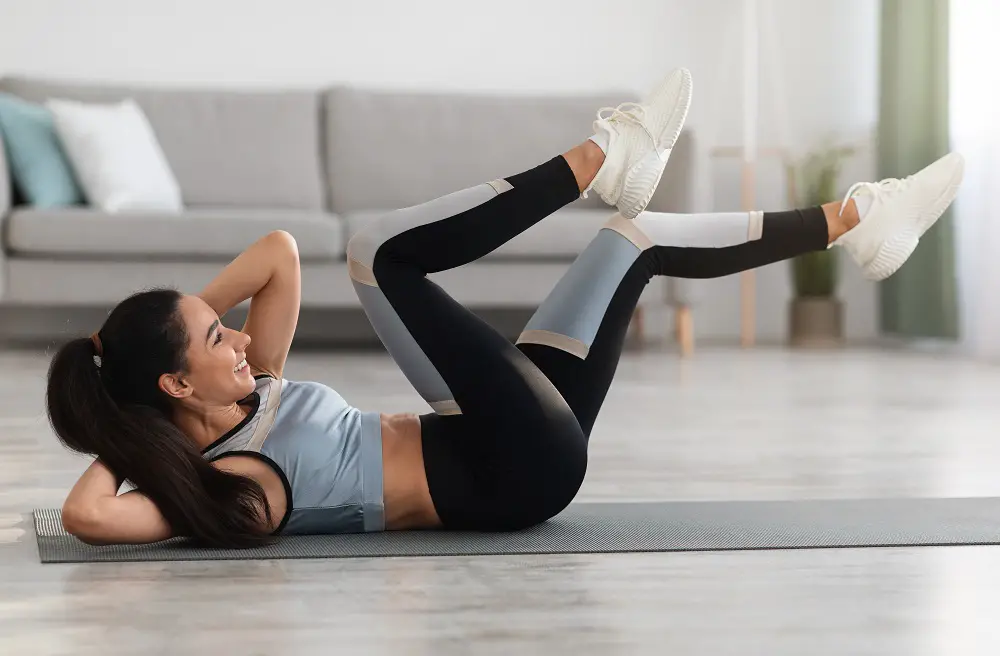 young woman doing crunches